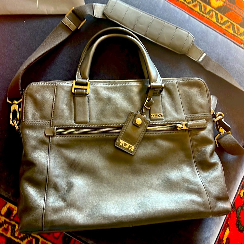 Tumi leather brief case in excellent condition.